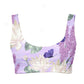 Floral and butterfly patterned tankini top on a white background