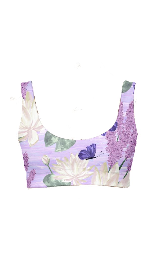 Floral and butterfly patterned tankini top on a white background