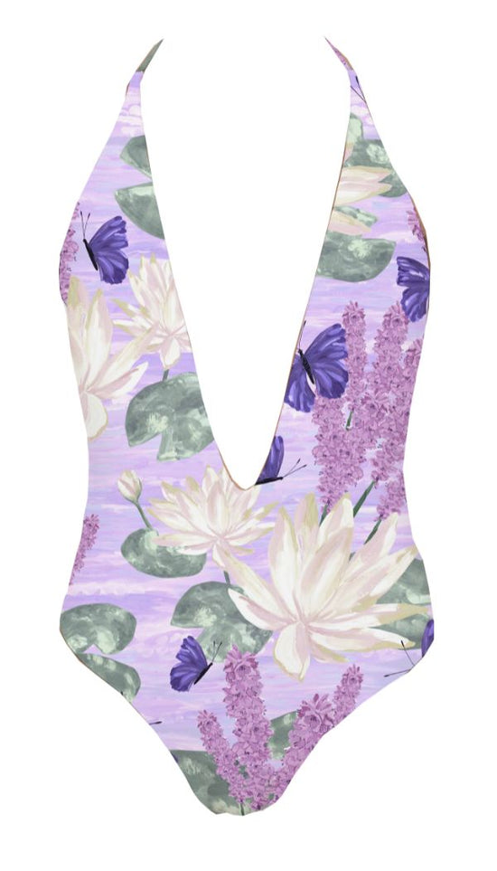 Floral-patterned swimsuit with a purple background on a white background