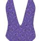 Purple swimsuit with butterflies on a white background