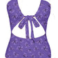 Purple butterfly-patterned swimsuit on a white background
